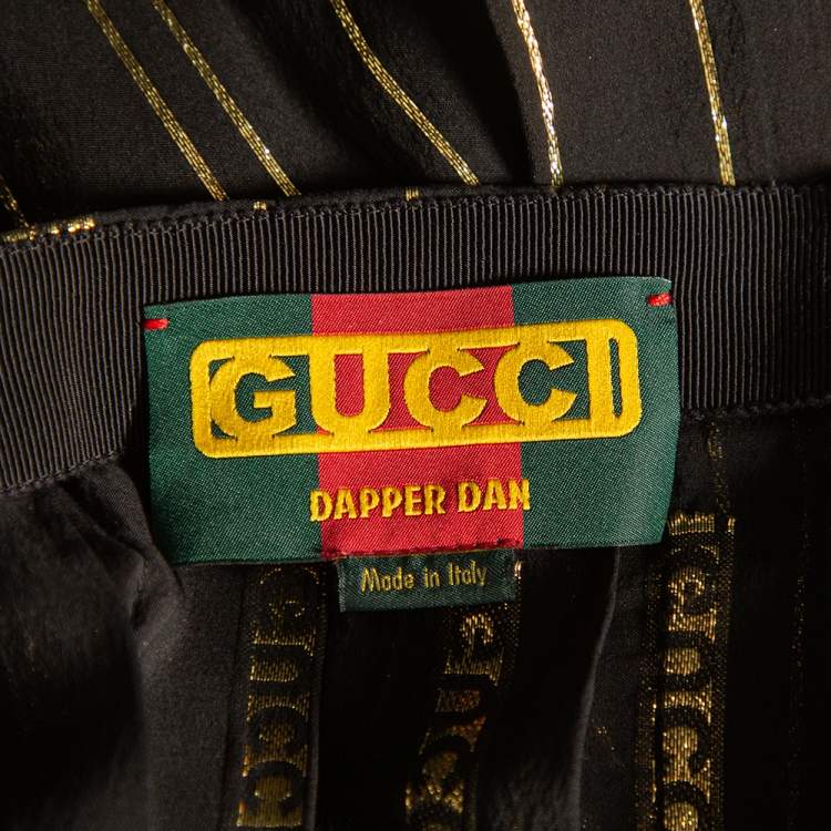 Pre Owned Gucci X Dapper Dan Black & Gold Silk Logo Detail Pleated Midi Skirt XS