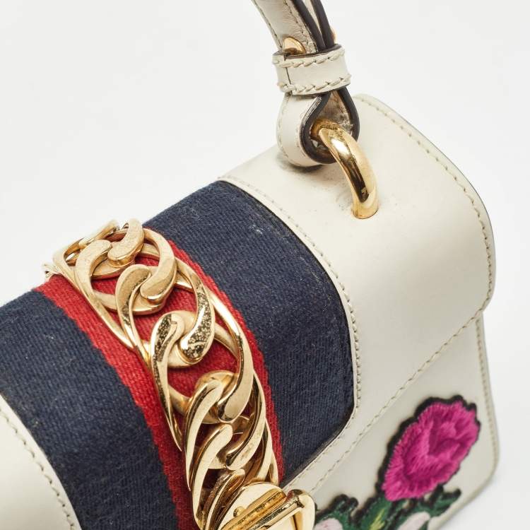 Pre Owned Gucci Off White Leather Mini Floral Patch Sylvie Top Handle Bag
