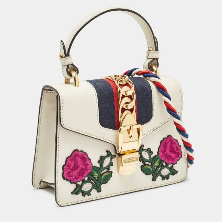 Pre Owned Gucci Off White Leather Mini Floral Patch Sylvie Top Handle Bag