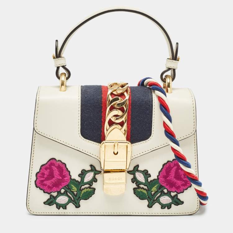 Pre Owned Gucci Off White Leather Mini Floral Patch Sylvie Top Handle Bag