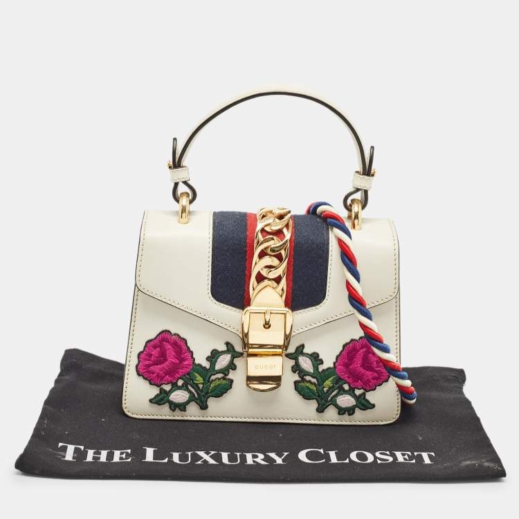 Pre Owned Gucci Off White Leather Mini Floral Patch Sylvie Top Handle Bag