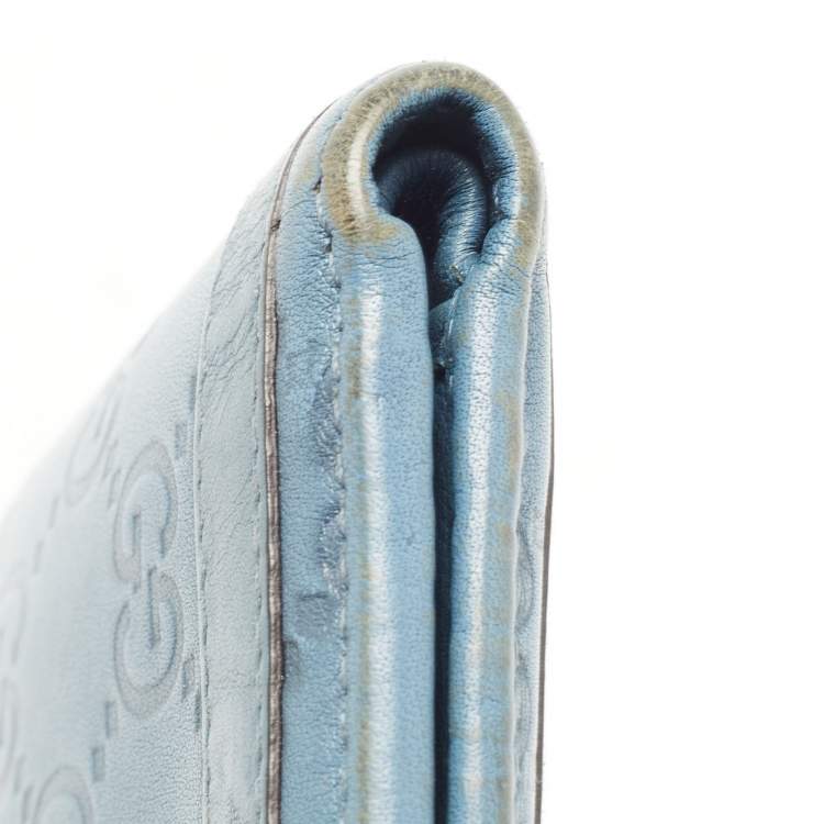Pre Owned Gucci Blue Guccissima Leather Metal Bar Bifold Wallet