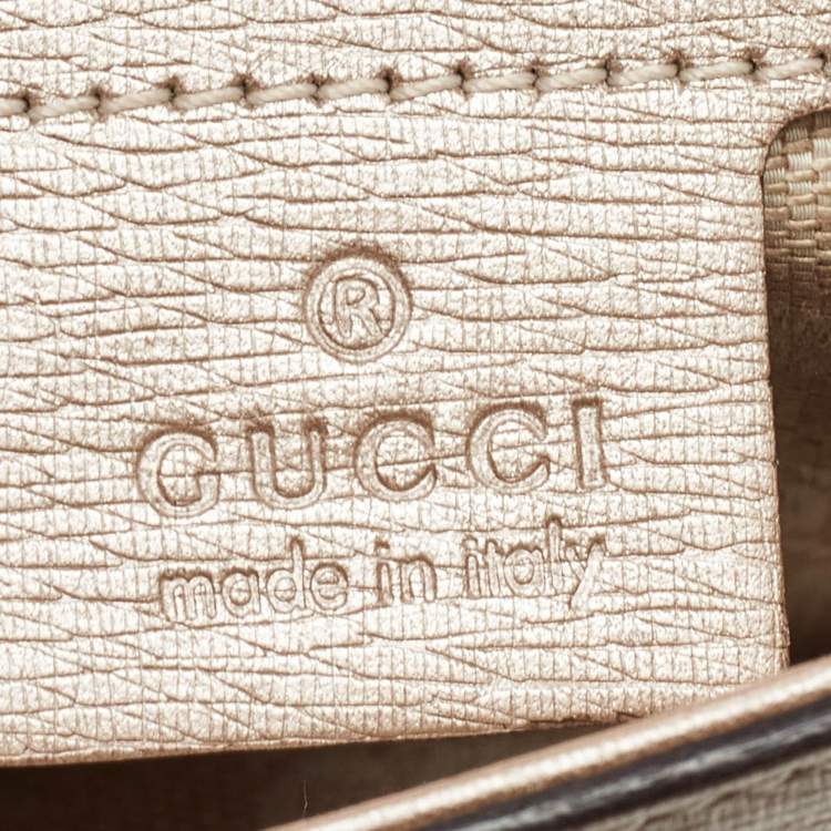 Pre Owned Gucci Metallic Beige Leather Bright Bit Clutch