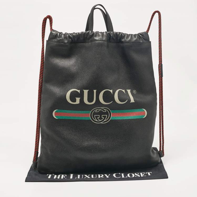 Pre Owned Gucci Black Leather Logo Drawstring Backpack
