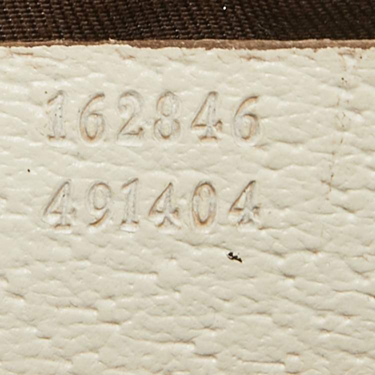 Pre Owned Gucci Beige GG Canvas and Leather Princy Wristlet Clutch
