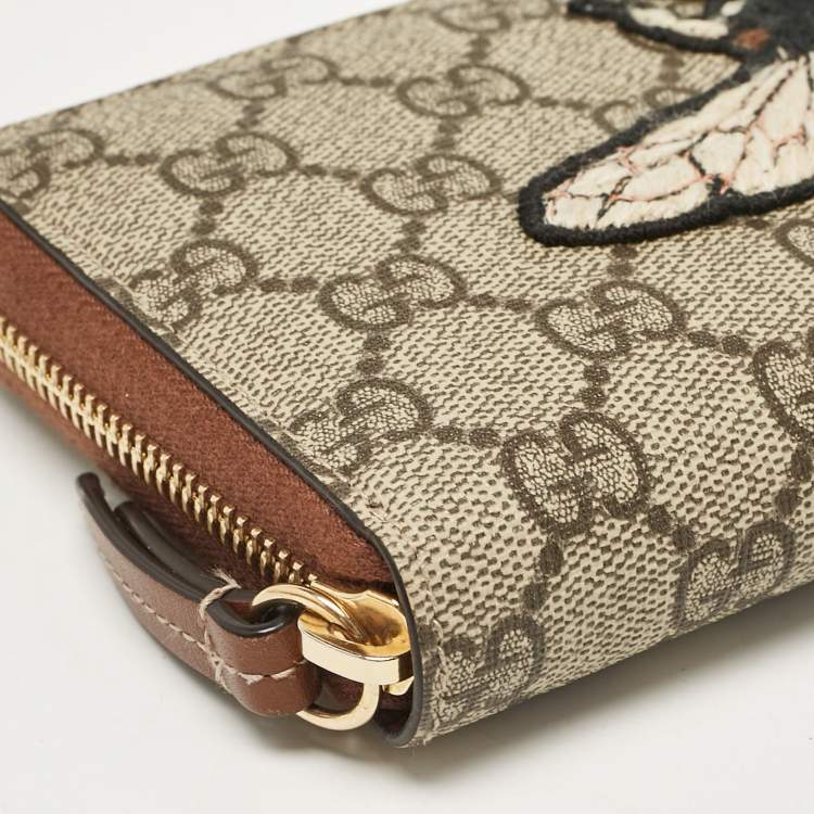 Pre Owned Gucci Beige Bee Printed GG Supreme Canvas Zip Around Continental Wallet