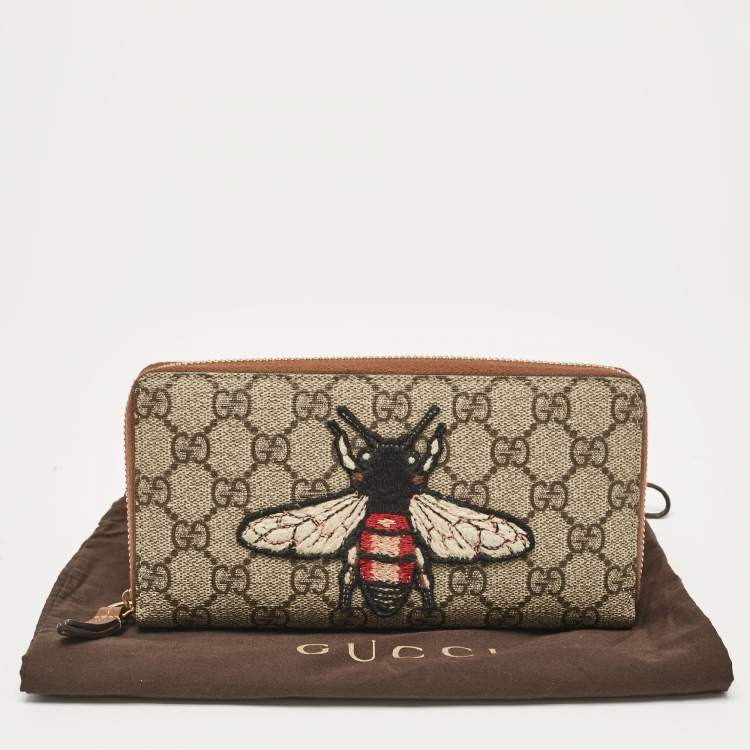 Pre Owned Gucci Beige Bee Printed GG Supreme Canvas Zip Around Continental Wallet