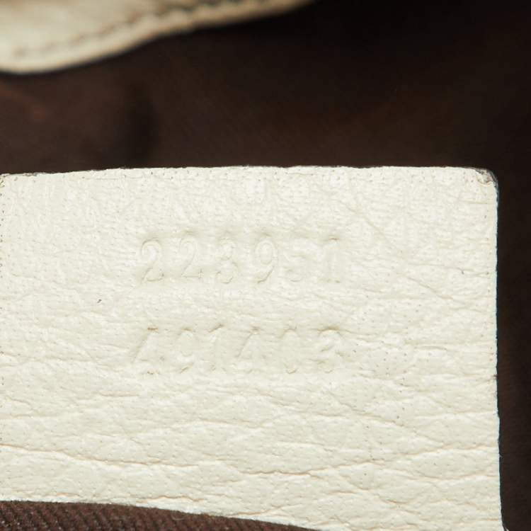 مملوكة مسبقًا Gucci Cream Leather Interlocking Icon Tassel Hobo