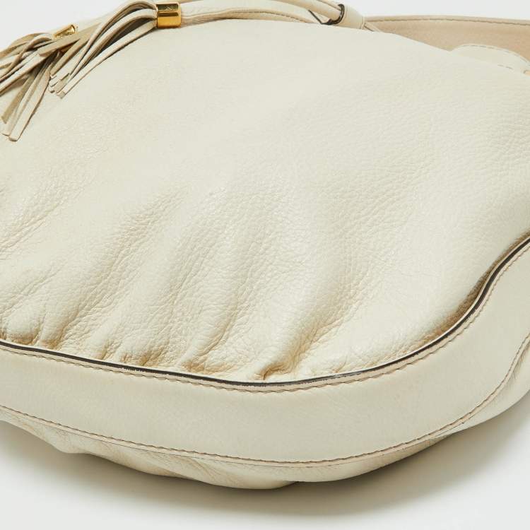مملوكة مسبقًا Gucci Cream Leather Interlocking Icon Tassel Hobo