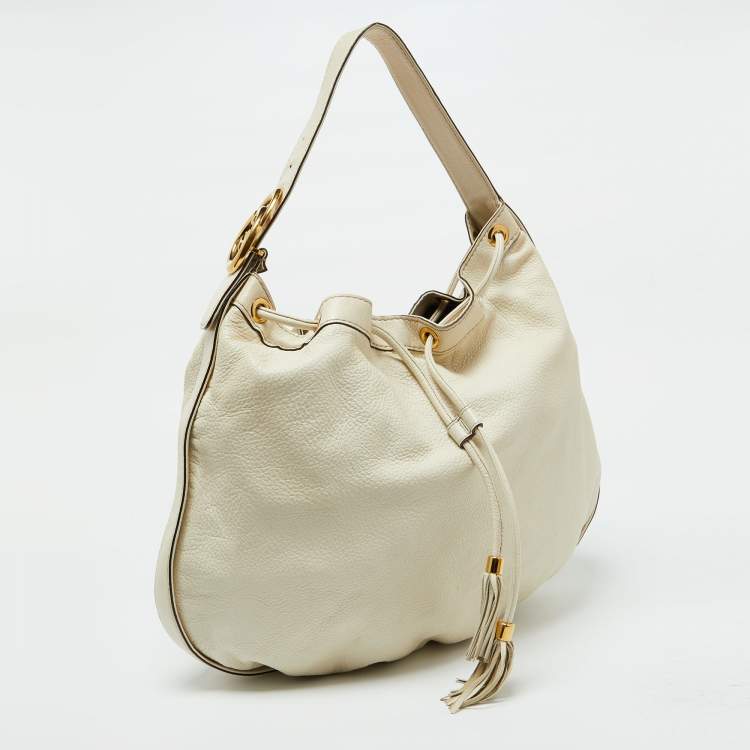 مملوكة مسبقًا Gucci Cream Leather Interlocking Icon Tassel Hobo