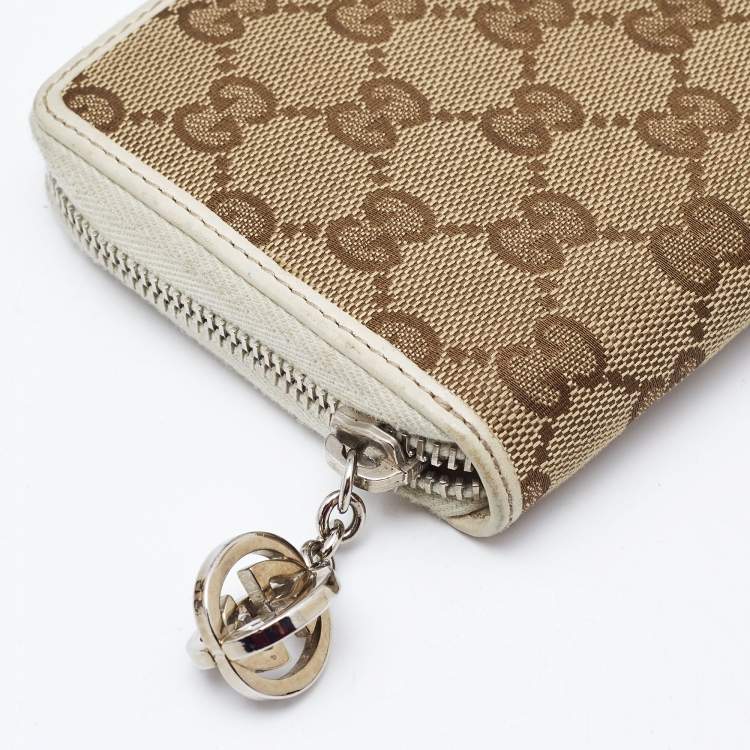 Pre Owned Gucci Beige/Cream GG Canvas and Leather Zip Around Wallet