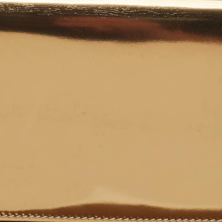 Pre Owned Gucci Gold Patent Leather Fur and Crystal Tassel Clutch