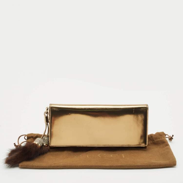 Pre Owned Gucci Gold Patent Leather Fur and Crystal Tassel Clutch