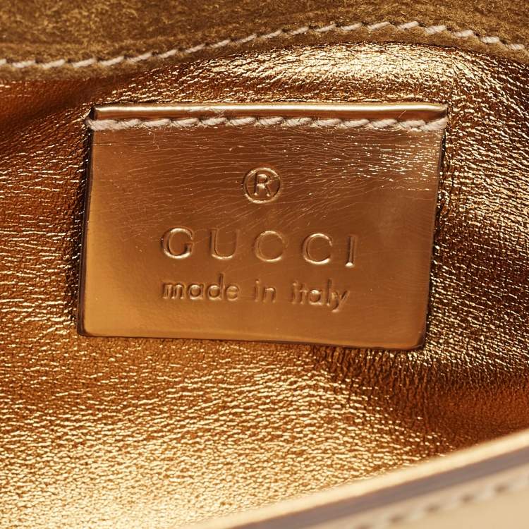 Pre Owned Gucci Gold Patent Leather Fur and Crystal Tassel Clutch