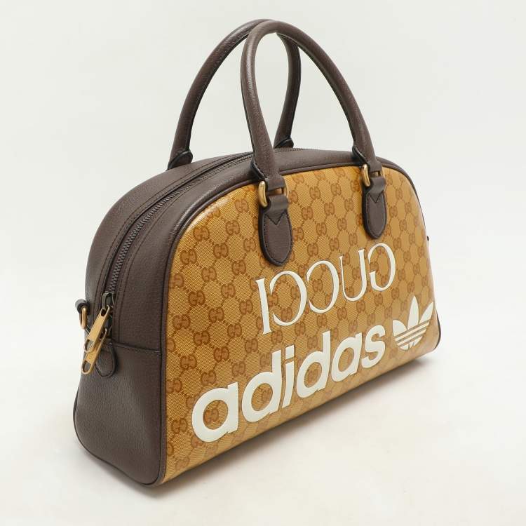 Pre Owned Gucci x Adidas Beige/Brown GG Crystal Canvas and Leather Medium Duffle Bag