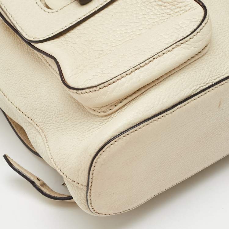 Pre Owned Gucci Off White Pebbled Leather GG Bamboo Tassel Backpack