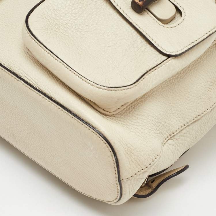 Pre Owned Gucci Off White Pebbled Leather GG Bamboo Tassel Backpack