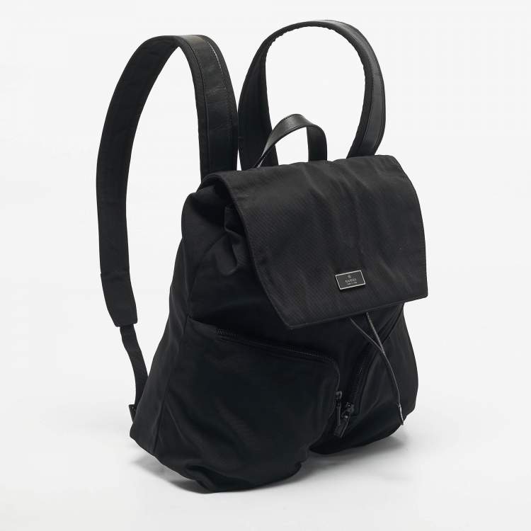 مملوكة مسبقًا Gucci Black Leather and Nylon Pocket Drawstring Backpack