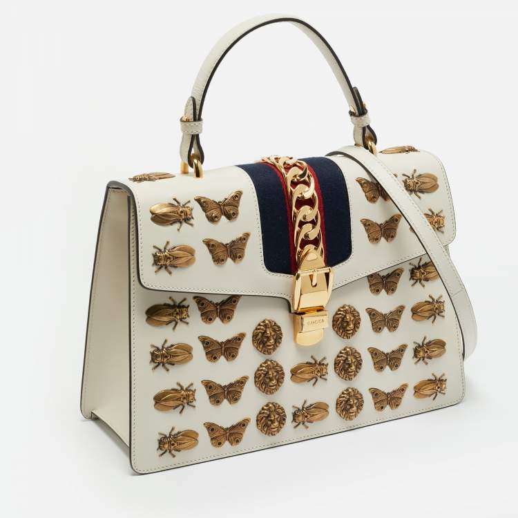 Pre Owned Gucci Off White Leather Medium Embellished Web Sylvie Top Handle Bag