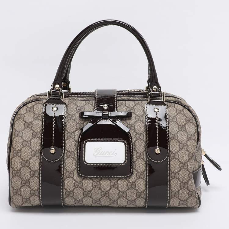 Pre Owned Gucci Brown/Beige GG Supreme Canvas and Patent Leather Buckle Flap Boston Bag