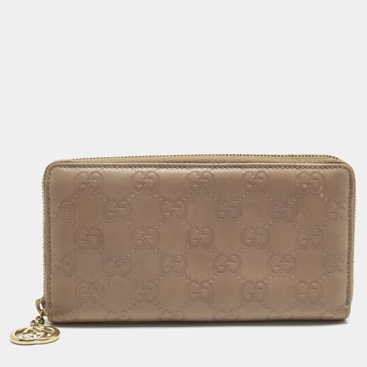 Pre Owned Gucci Interlocking G Beige Guccissima Leather Zip Around Wallet