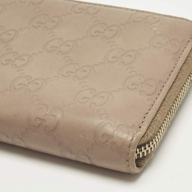 Pre Owned Gucci Interlocking G Beige Guccissima Leather Zip Around Wallet