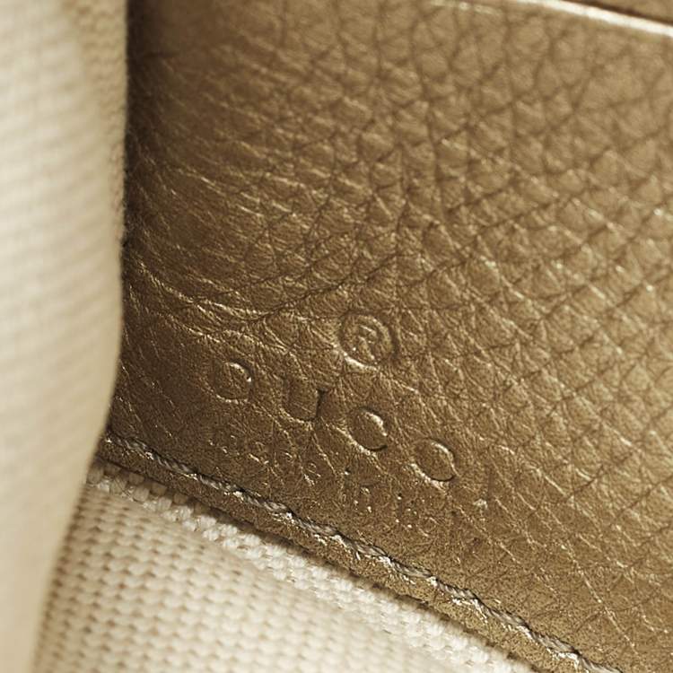 Pre Owned Gucci Soho Metallic Beige Leather Wristlet Clutch