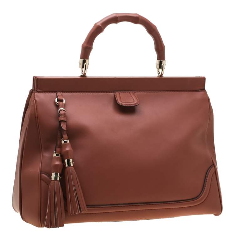 Pre Owned Gucci Solid Peach Leather Bold Bamboo Top Handle Bag