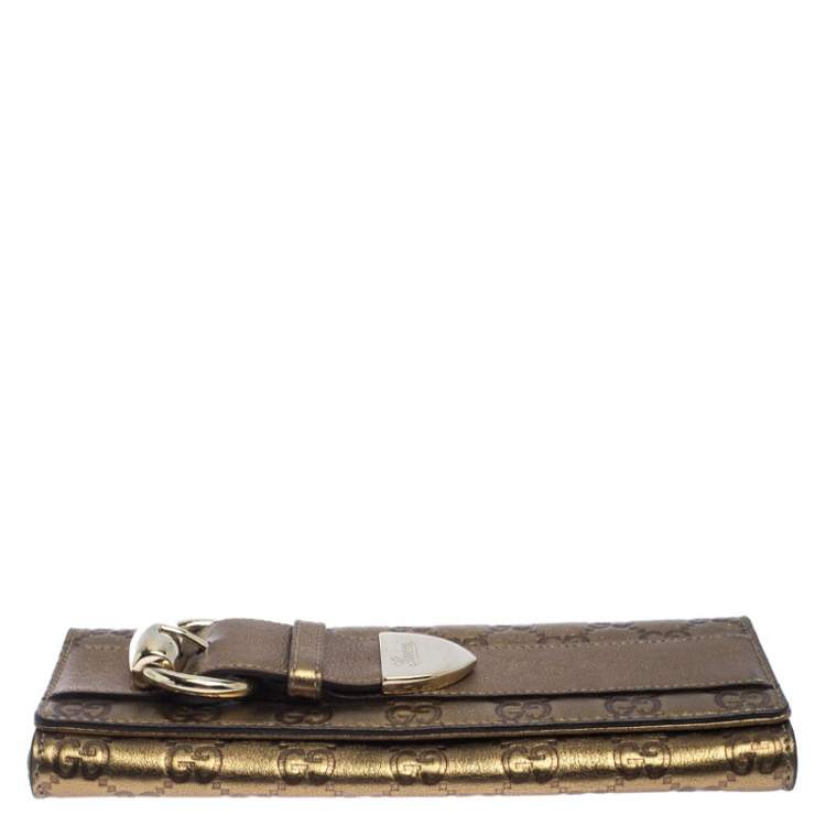 مملوكة مسبقًا Gucci Gold Guccissima Leather Romy Clutch