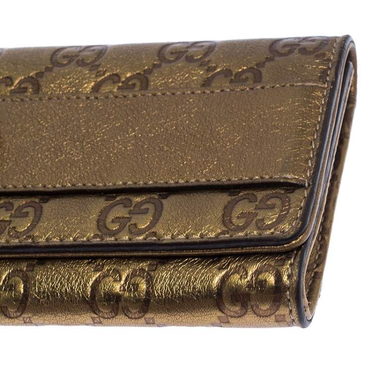 مملوكة مسبقًا Gucci Gold Guccissima Leather Romy Clutch