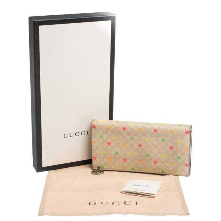 Pre Owned Gucci White Micro GG Supreme Canvas Neon Stars Continental Wallet 