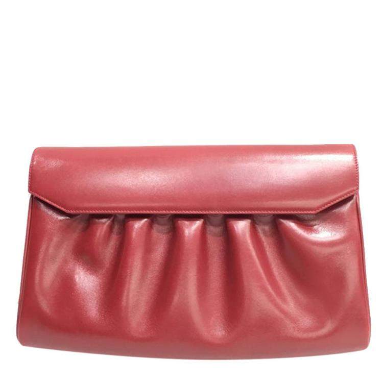 red leather clutch