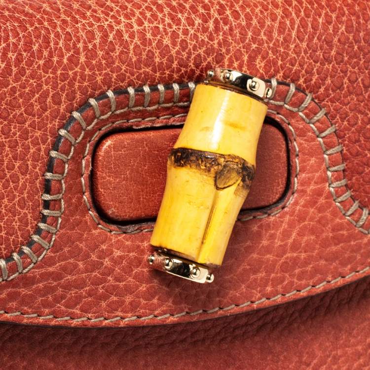 Pre Owned Gucci Dark Orange Grain Leather Tassel New Bamboo Top Handle Bag