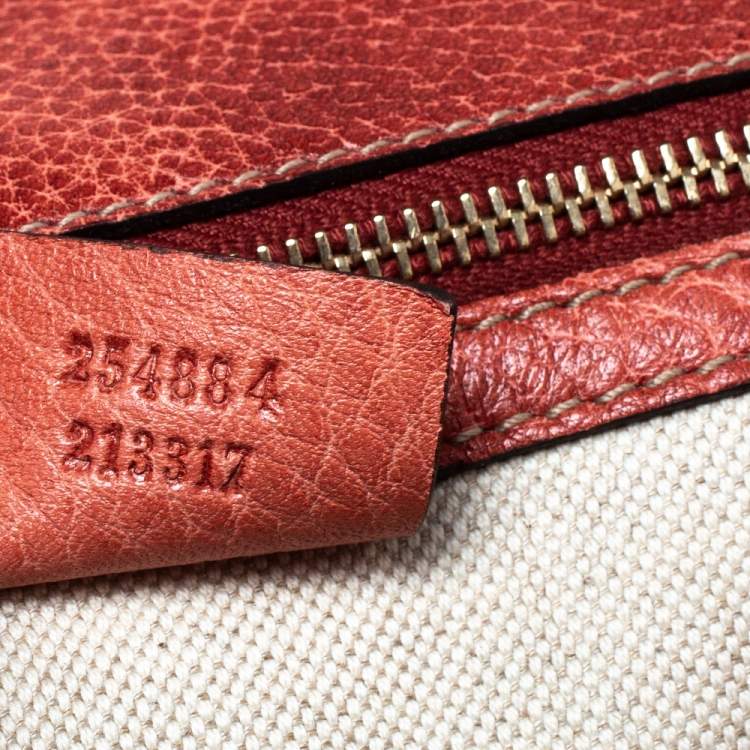 Pre Owned Gucci Dark Orange Grain Leather Tassel New Bamboo Top Handle Bag