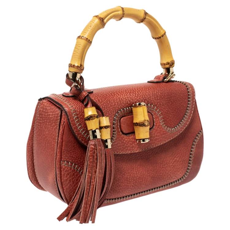 Pre Owned Gucci Dark Orange Grain Leather Tassel New Bamboo Top Handle Bag