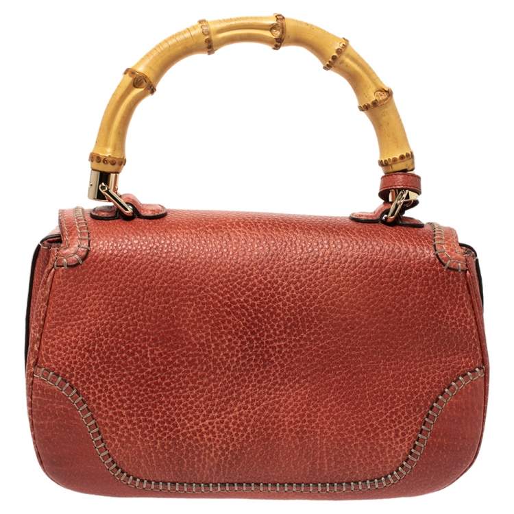 Pre Owned Gucci Dark Orange Grain Leather Tassel New Bamboo Top Handle Bag