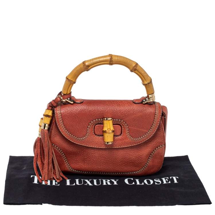 Pre Owned   Gucci Dark Orange Grain Leather Medium New Bamboo Top Handle Bag