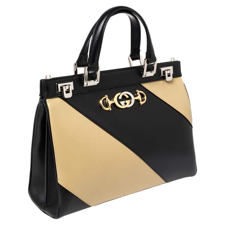 Pre Owned Gucci Black/Beige Leather Zumi Diagonal Stripe Top Handle Bag