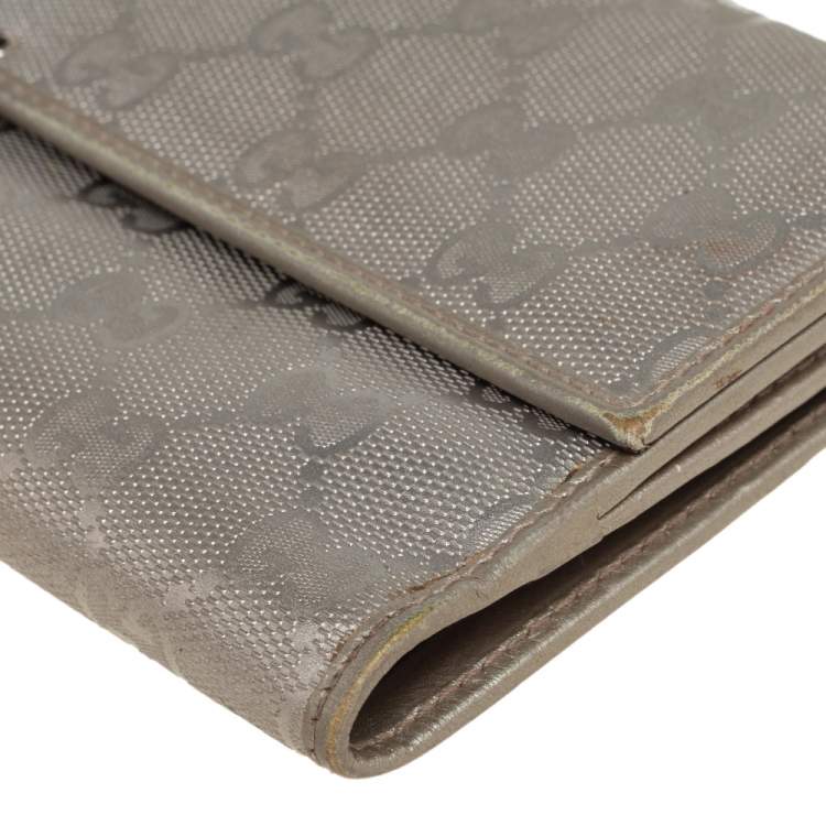 Pre Owned Gucci Metallic Silver GG Imprime Canvas Trifold Wallet