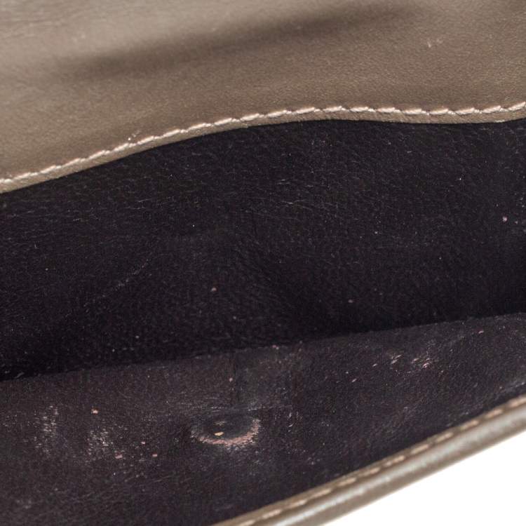 Pre Owned Gucci Metallic Silver GG Imprime Canvas Trifold Wallet