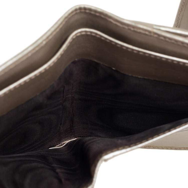 Pre Owned Gucci Metallic Silver GG Imprime Canvas Trifold Wallet