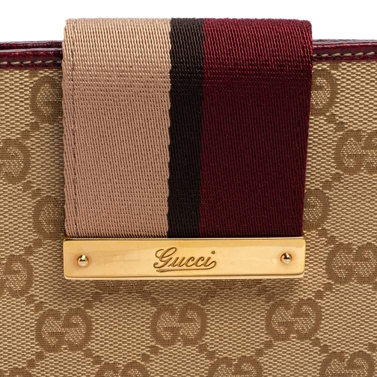 Pre Owned Gucci Multicolor GG Canvas and Leather Web Flap French Wallet