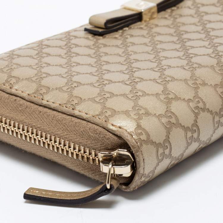 Pre Owned Gucci Metallic Beige Microguccissima Leather Bow  Zip Around Wallet