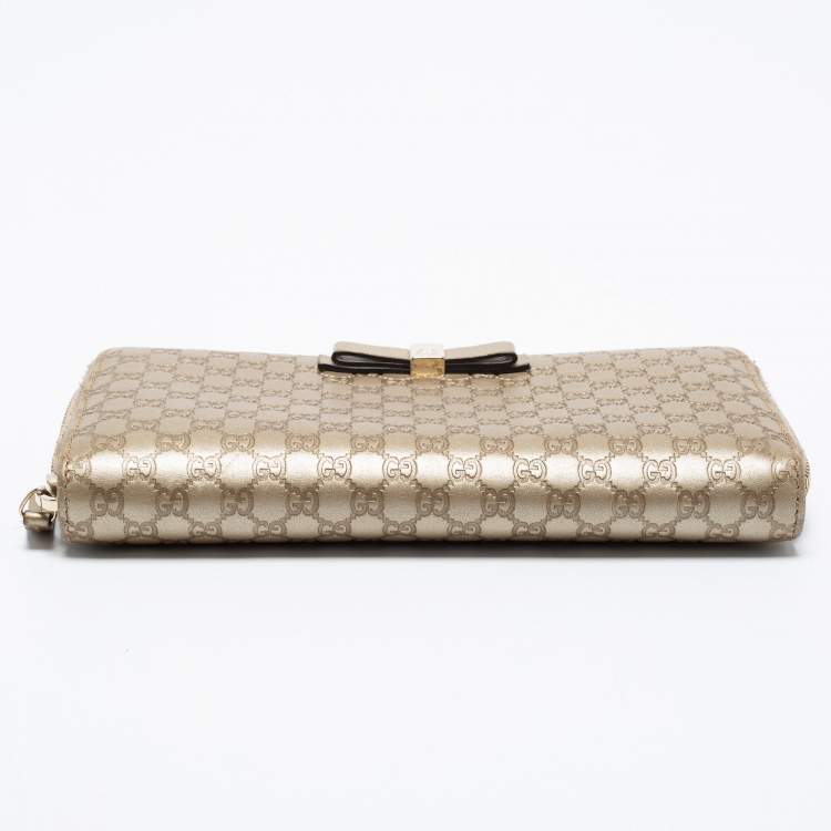 Pre Owned Gucci Metallic Beige Microguccissima Leather Bow  Zip Around Wallet