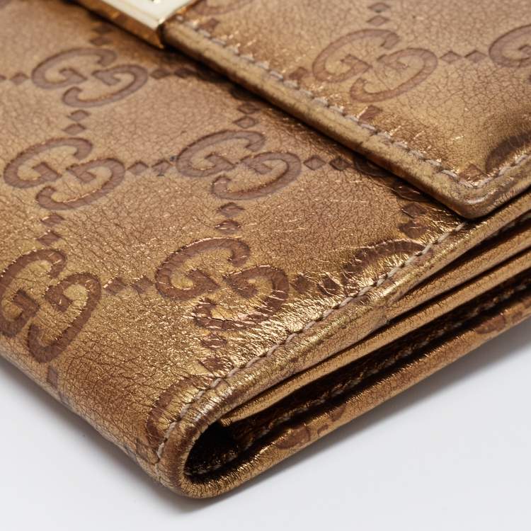مملوكة مسبقًا Gucci Metallic Gold Guccissima Leather Flap Continental Wallet