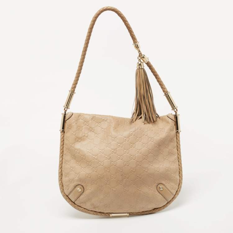 Pre Owned Gucci Beige Guccissima Leather Medium Britt Tassel Hobo