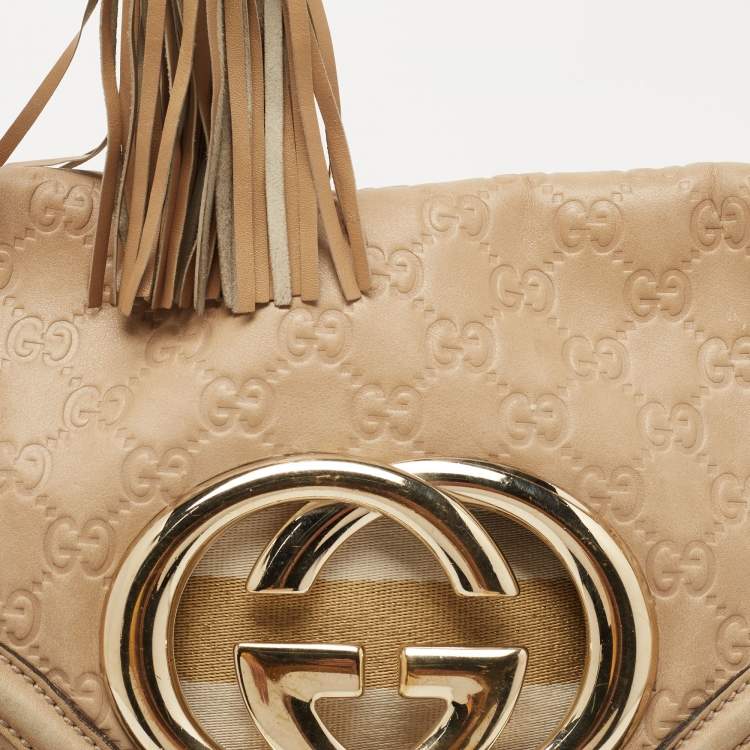 Pre Owned Gucci Beige Guccissima Leather Medium Britt Tassel Hobo
