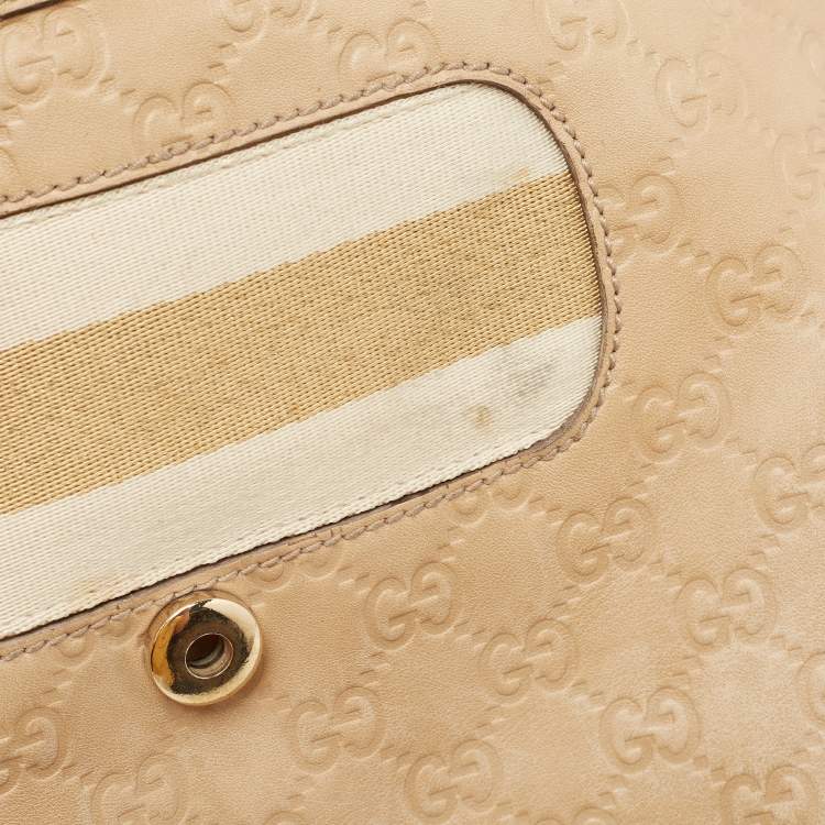 Pre Owned Gucci Beige Guccissima Leather Medium Britt Tassel Hobo