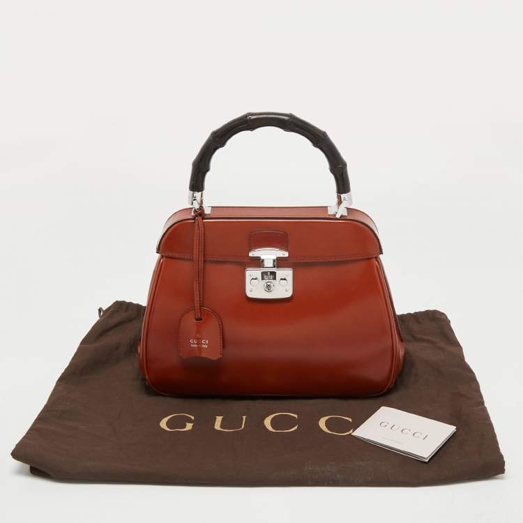 Pre Owned Gucci Brown Glossy Leather Medium Lady Lock Top Handle Bag