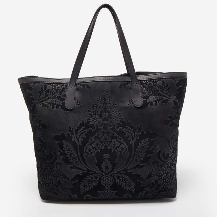 مملوكة مسبقًا Gucci Black Floral Print Suede Stirrup Tote